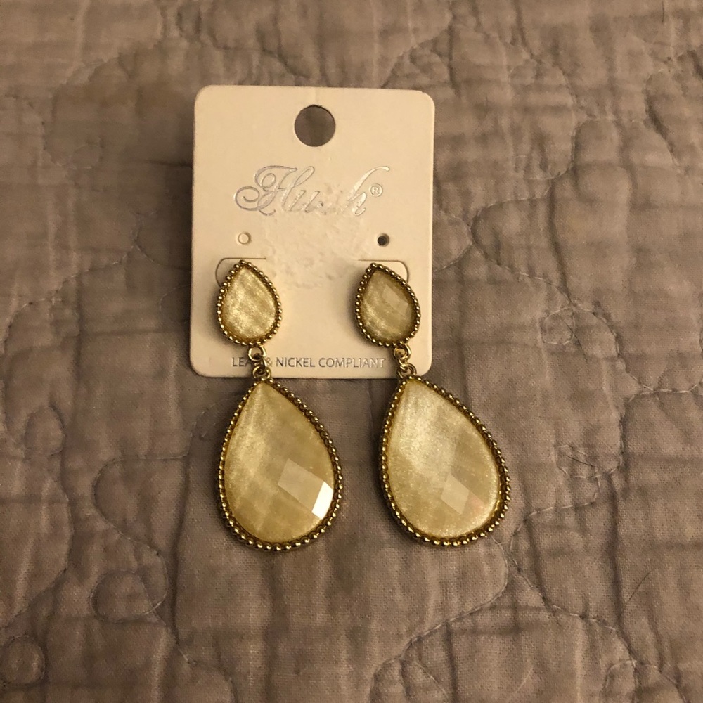 Beautiful cream colored teardrop shaped earring